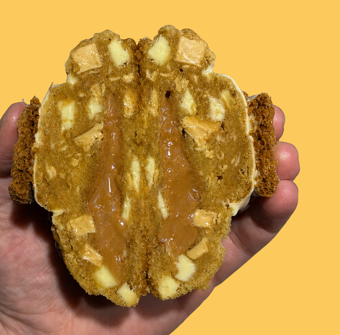 Biscoff and Caramilk cookie cross section showing cookie butter and caramel filling